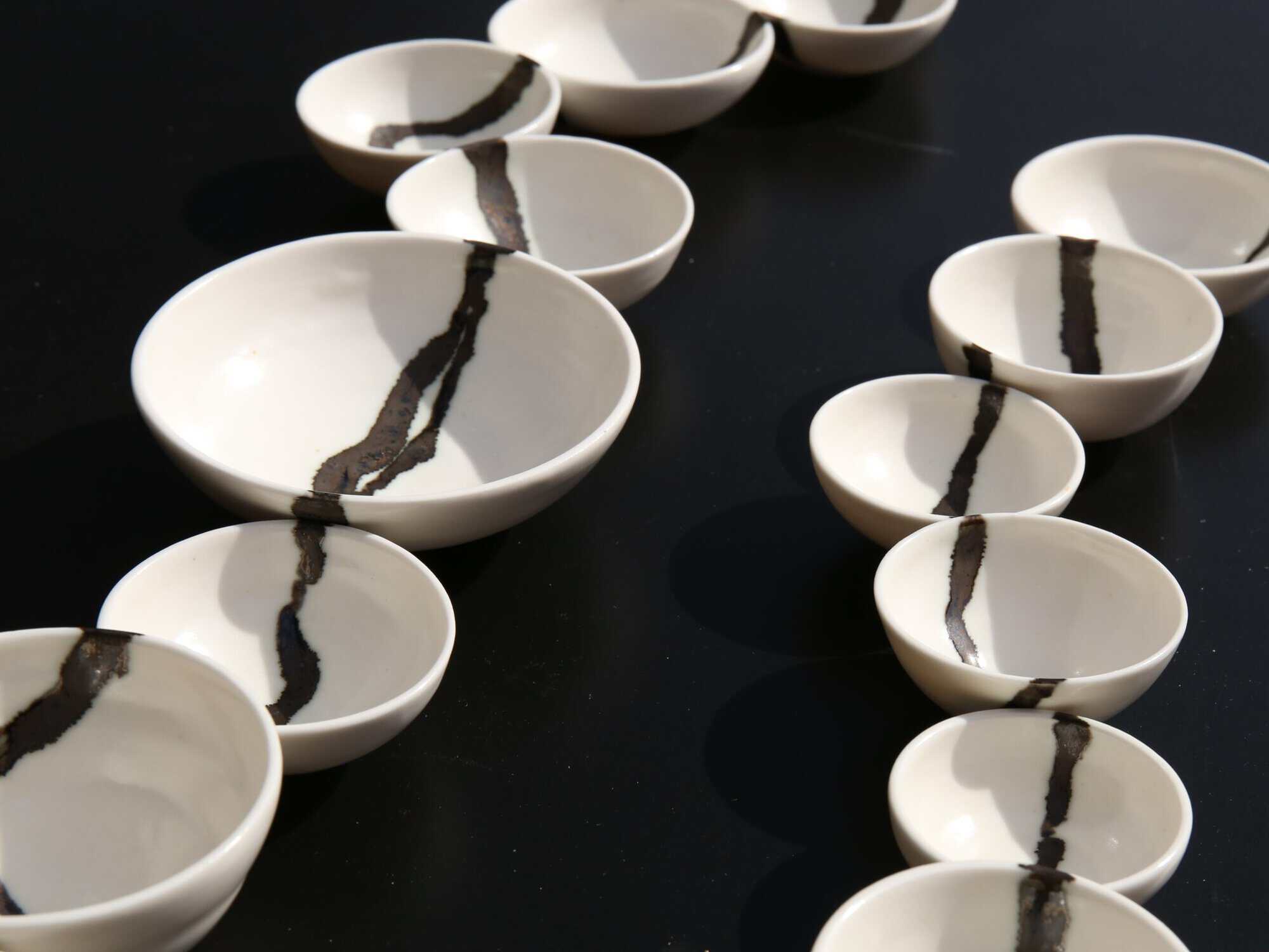 set of porcelain bowls with a line